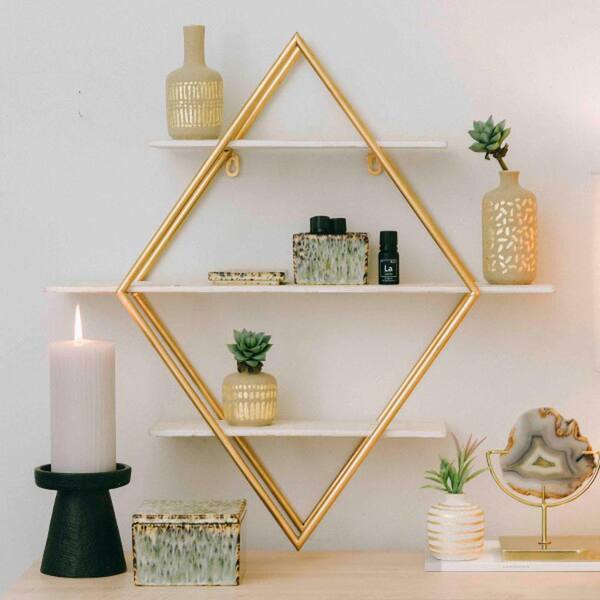 https://images.thdstatic.com/productImages/4232ddec-de0d-434a-ae39-0f8db2f62019/svn/white-gold-storied-home-decorative-shelving-ec0476-31_600.jpg