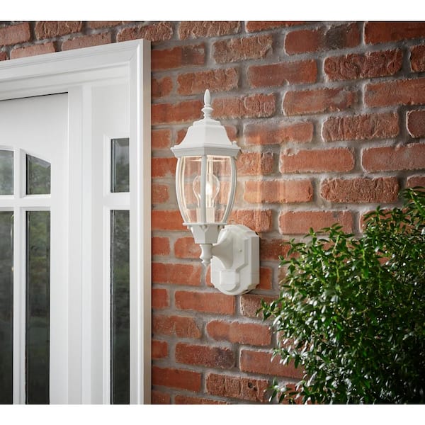 Alexandria 17.3 in. 1-Light Farmhouse Matte White Motion Sensing, Dusk-to-Dawn, Outdoor Wall Light Lantern Sconce