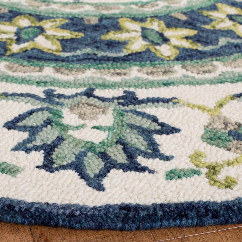 Handmade Ivory and Blue Round Wool Tufted Area Rug
