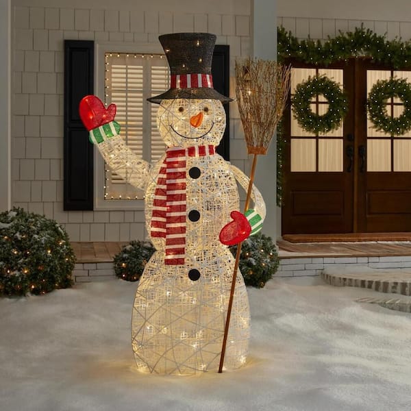 6 ft. Polar Wishes LED Snowman with Broom Holiday Yard Decoration Y44