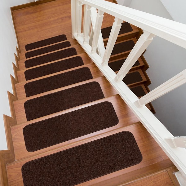 https://images.thdstatic.com/productImages/42525505-f16c-4d47-abfb-35ac00403360/svn/brown-beverly-rug-stair-tread-covers-hd-trd10648-8pk-c3_600.jpg