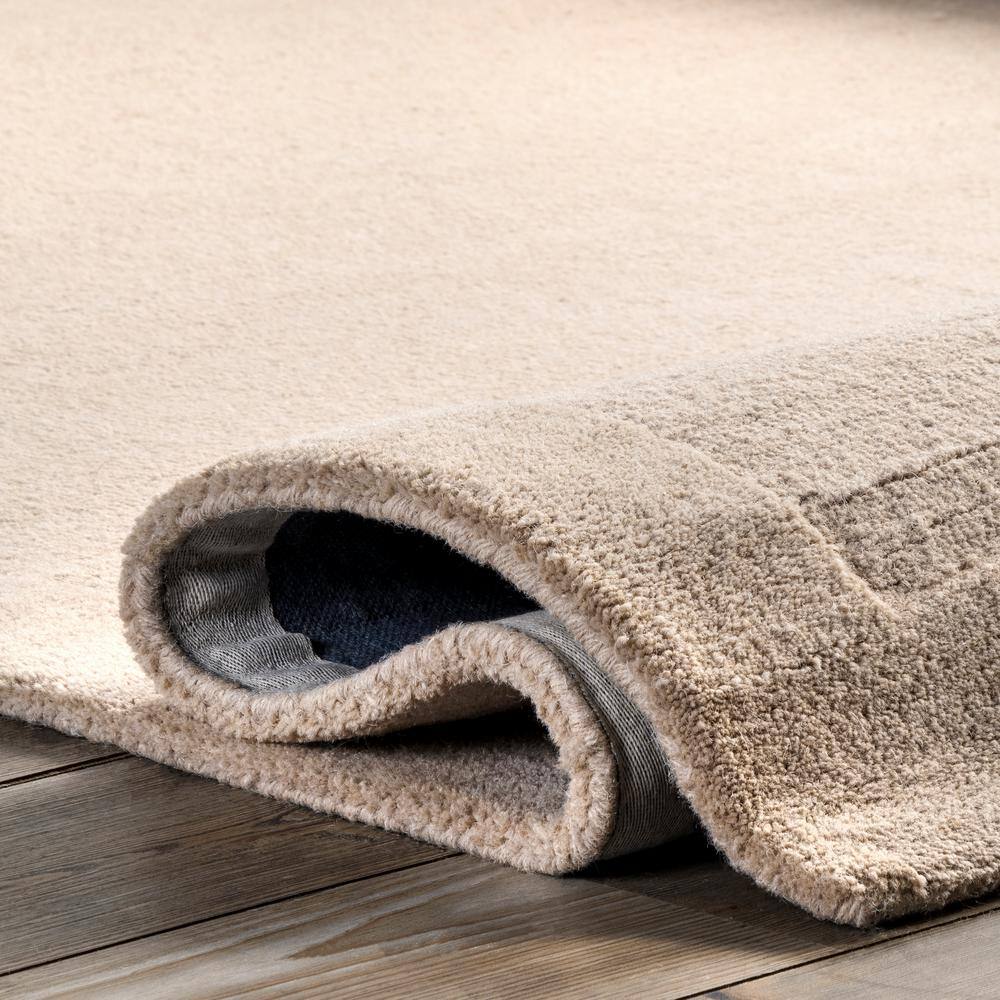 Beige Handmade Wool 4' x 6' Tufted Area Rug