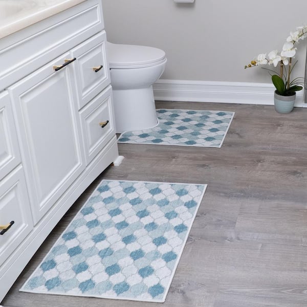 https://images.thdstatic.com/productImages/425b4546-767b-41f3-beff-a3f382127ce4/svn/moroccan-gray-blue-sussexhome-bathroom-rugs-bath-mats-cntr-ot-01-set2-e1_600.jpg
