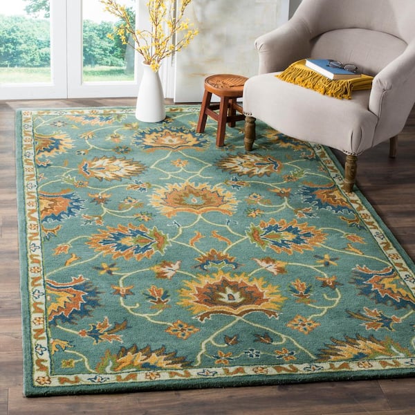 Heritage 10 ft. x 14 ft. Light Blue Border Ornate Area Rug