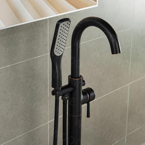 https://images.thdstatic.com/productImages/4269bb08-107c-4050-bb31-8a4b7e583096/svn/oil-rubbed-bronze-woodbridge-claw-foot-tub-faucets-f1032-a0_600.jpg