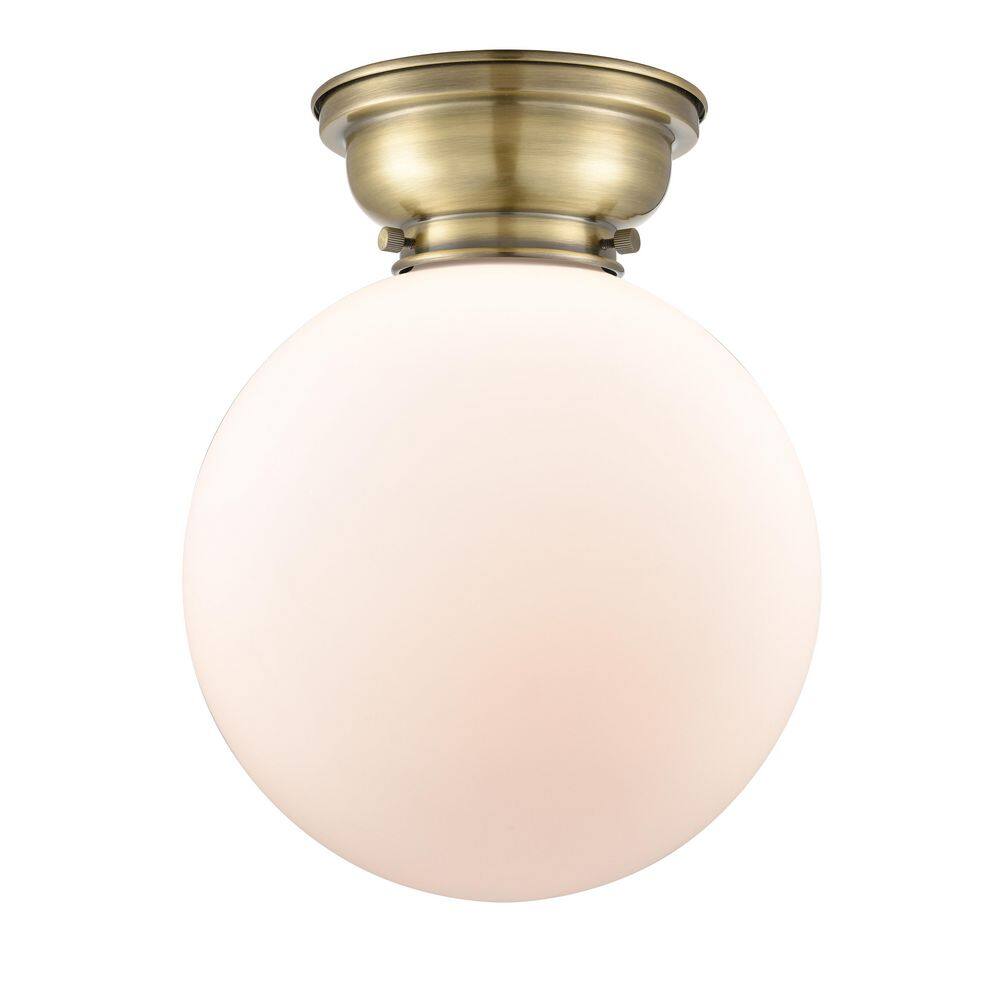 Beacon 10 in. 1-Light Antique Brass Industrial Flush Mount with Seeded Glass Shade price history on PriceWatchPro
