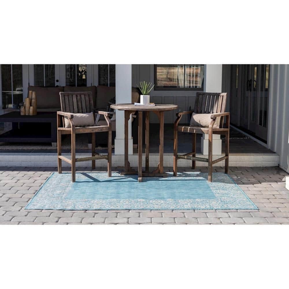 Aqua Floral Bliss Easy-Care Synthetic Outdoor Rug 7'1" x 10'