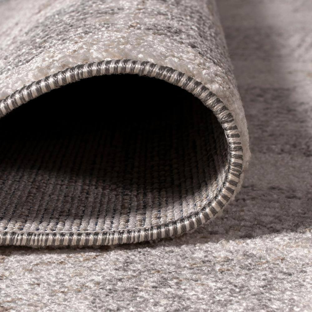 Bhalil 5' x 8' Gray and Beige Geometric Area Rug