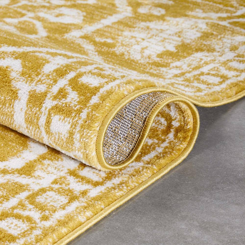 Gold 5' x 7' Synthetic Oriental Easy Care Rug