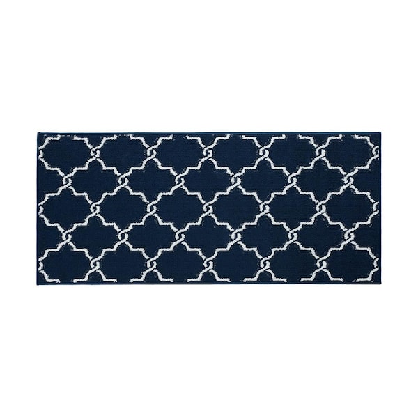 https://images.thdstatic.com/productImages/42924254-3fa9-4ee2-b4f5-108443b3a513/svn/navy-and-white-jean-pierre-area-rugs-yma016688-64_600.jpg