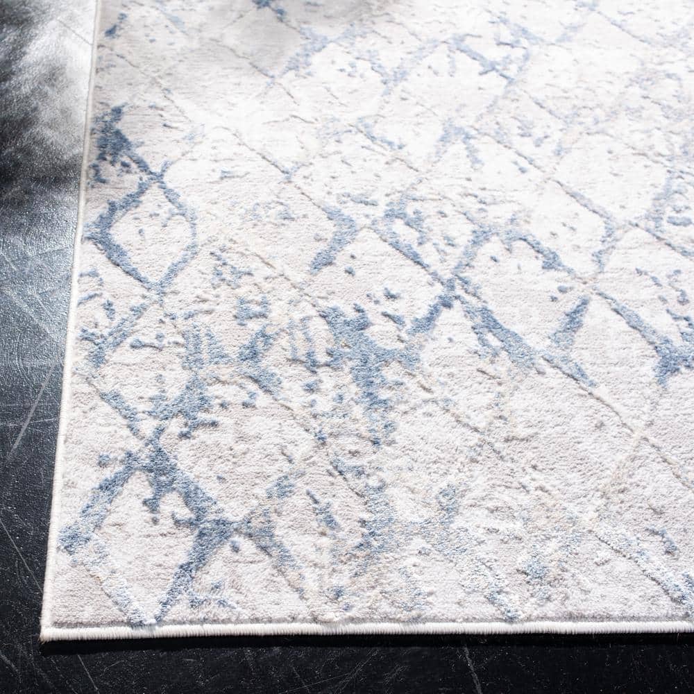 Light Grey and Blue Synthetic 10' x 14' Area Rug