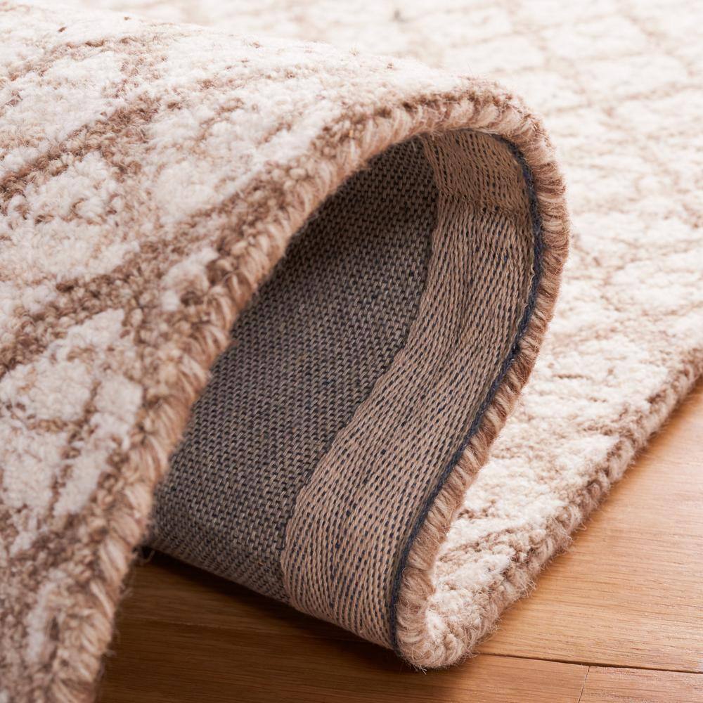 Ivory and Brown Handmade Abstract Wool Area Rug