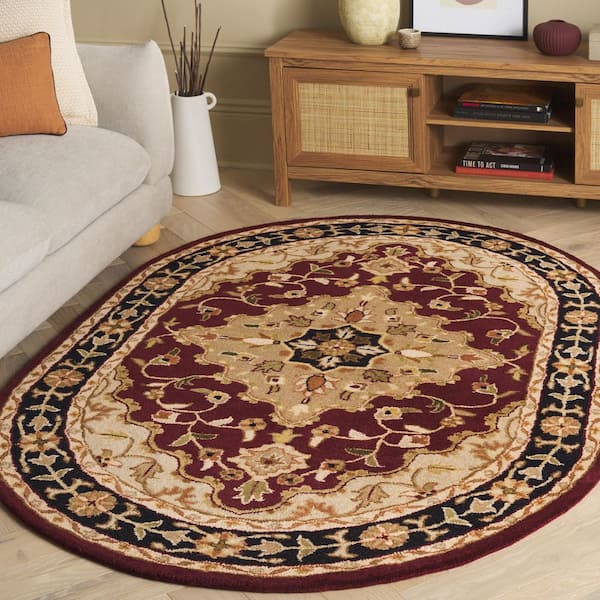 Heritage 5 ft. x 7 ft. Oval Red/Black Medallion Border Area Rug