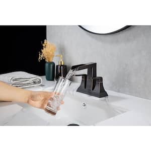 Mondawell Open Waterfall 4 in. Centerset Double-Handle Low Arc Bathroom Faucet with Drain in Bronze