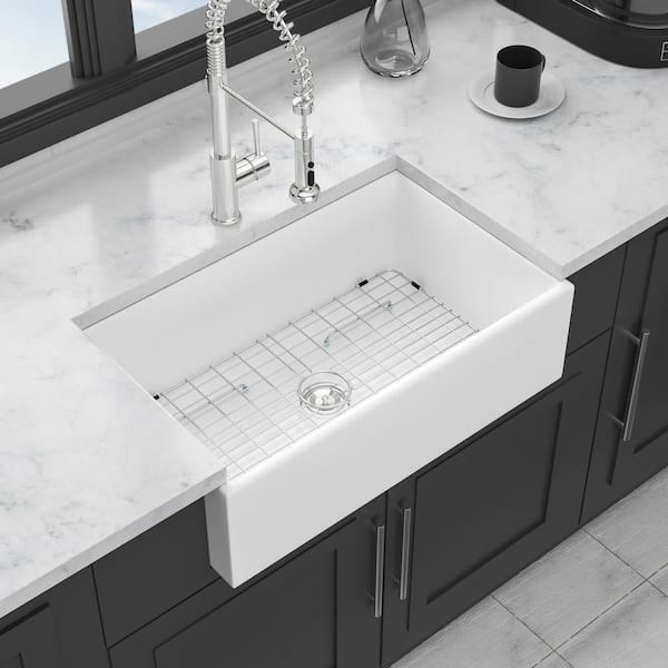 Kuomih White Ceramic 33 in. Single Bowl Farmhouse Apron front Kitchen Sink with Bottom Grid and Basket Strainer