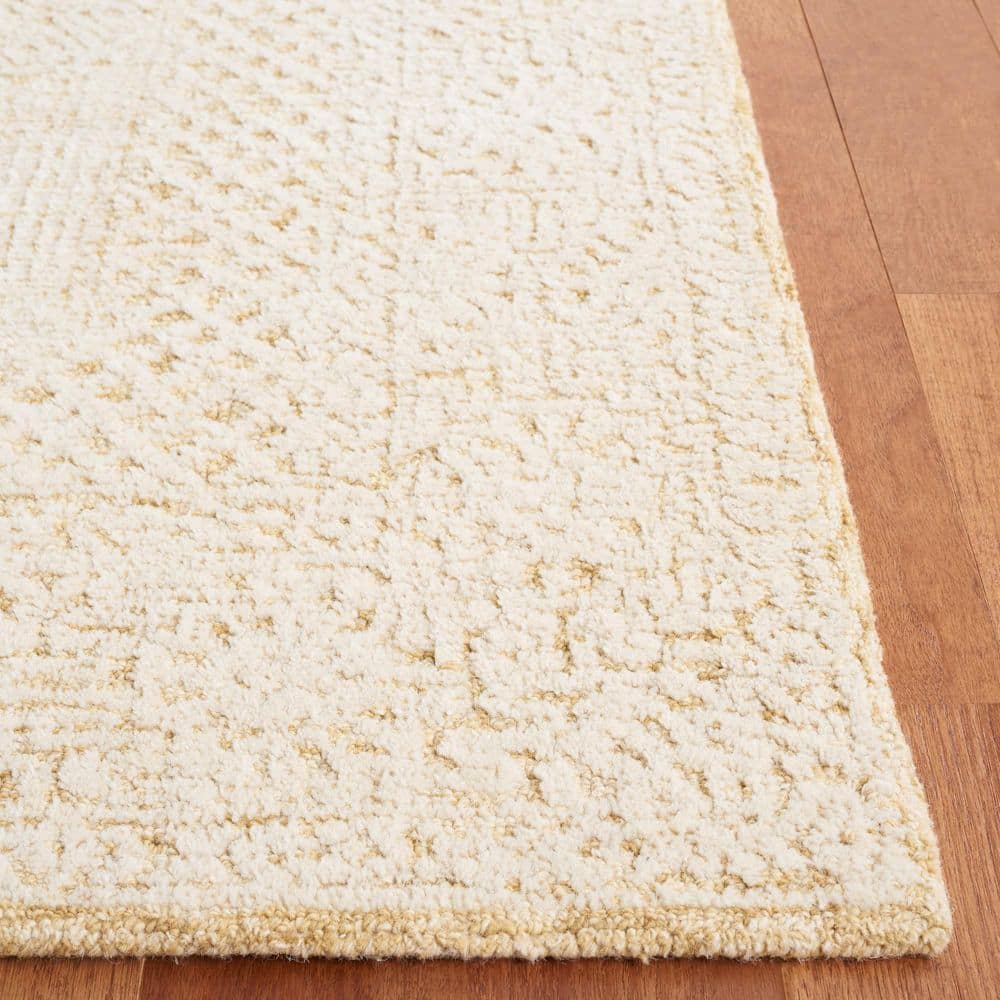 Ivory and Gold Geometric Wool Handmade Area Rug 6' x 9'