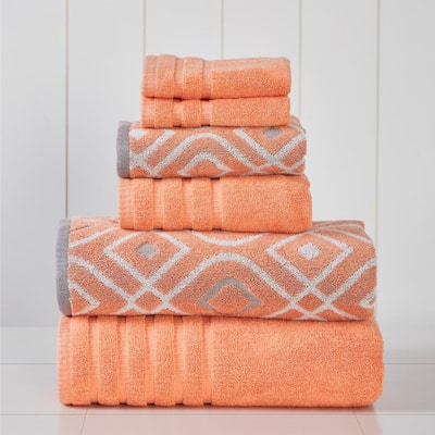 https://images.thdstatic.com/productImages/42e2cb29-5ea3-40e4-9e9c-243671f173ee/svn/coral-modern-threads-bath-towels-5ydjqoxg-crl-st-64_400.jpg