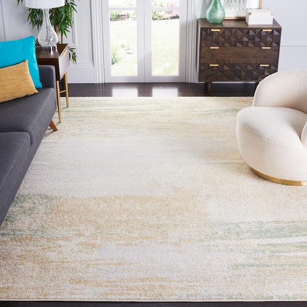 Adirondack Ivory/Gold 9 ft. x 12 ft. Solid Color Distressed Area Rug