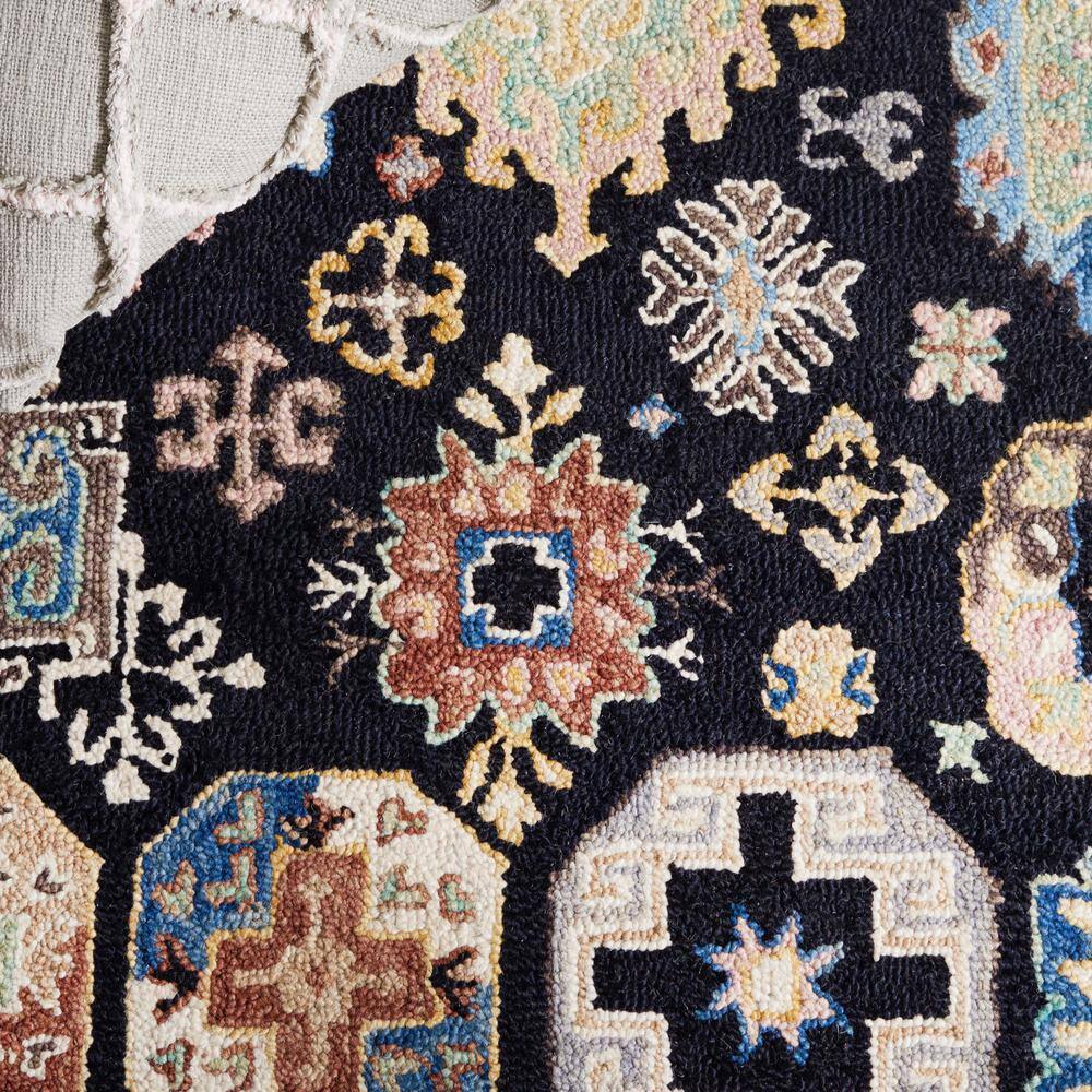 Handmade Black and Ivory Geometric Wool Round Area Rug
