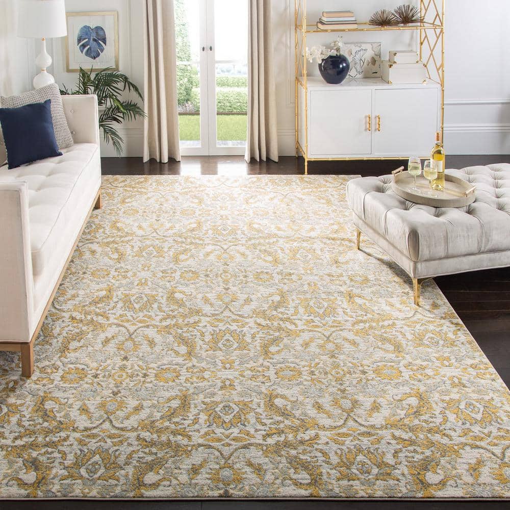 Elegant Ivory Gold 10' x 14' Hand-Knotted Synthetic Area Rug