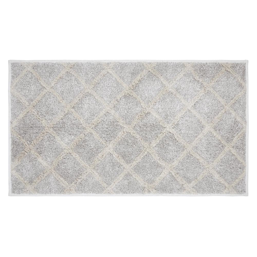 https://images.thdstatic.com/productImages/431face4-a6bb-4986-b7af-4d23ccf7e30f/svn/oatmeal-tan-soft-white-vhc-brands-bathroom-rugs-bath-mats-80531-64_1000.jpg