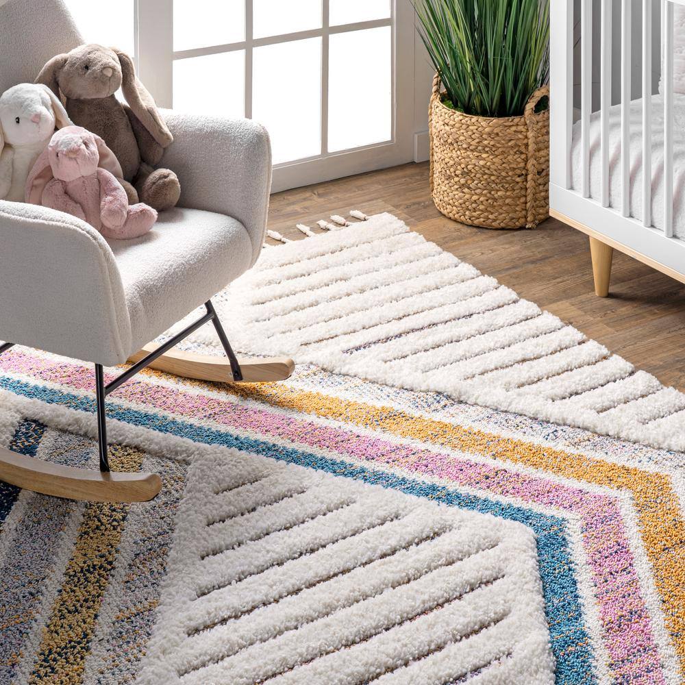 Ivory Geometric Synthetic Rectangular Area Rug with Braided Tassels