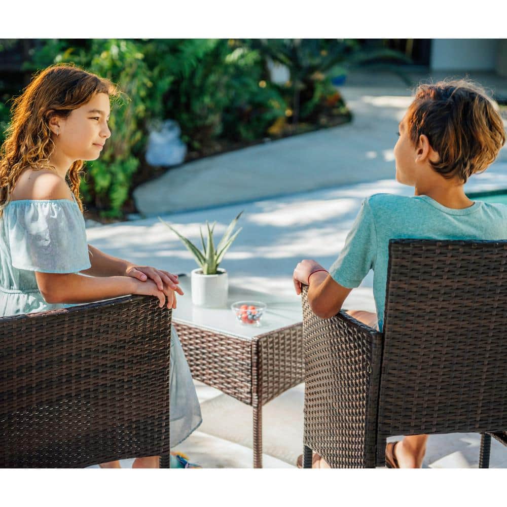 4-Piece Brown Wicker Outdoor Seating Set with Blue Cushions