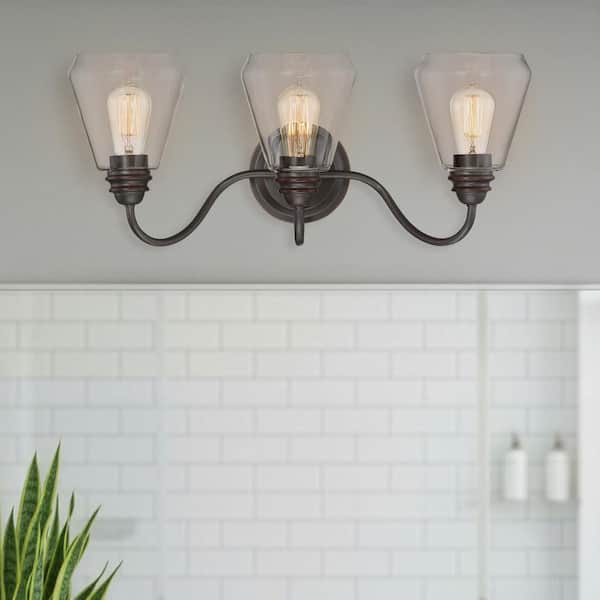 Designers Fountain Foundry 24 in. 3-Light Satin Bronze Industrial Vanity Light with Clear Glass Shades