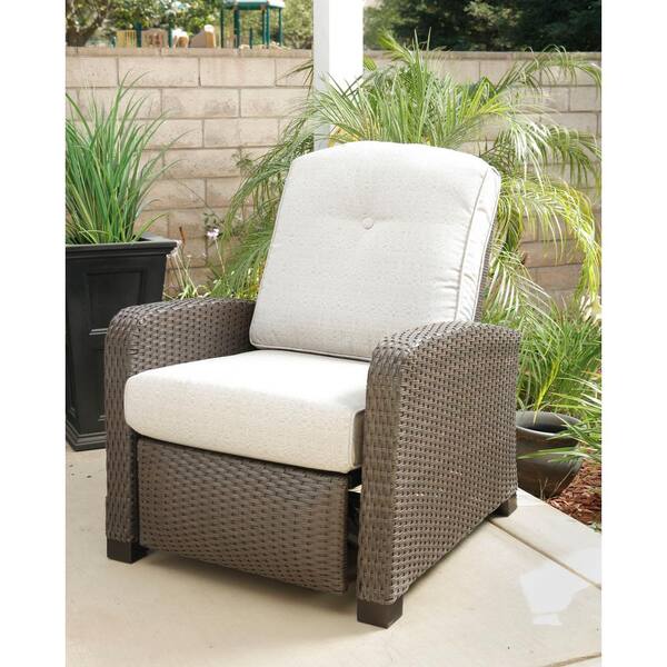 brown wicker outdoor recliner rocking chair