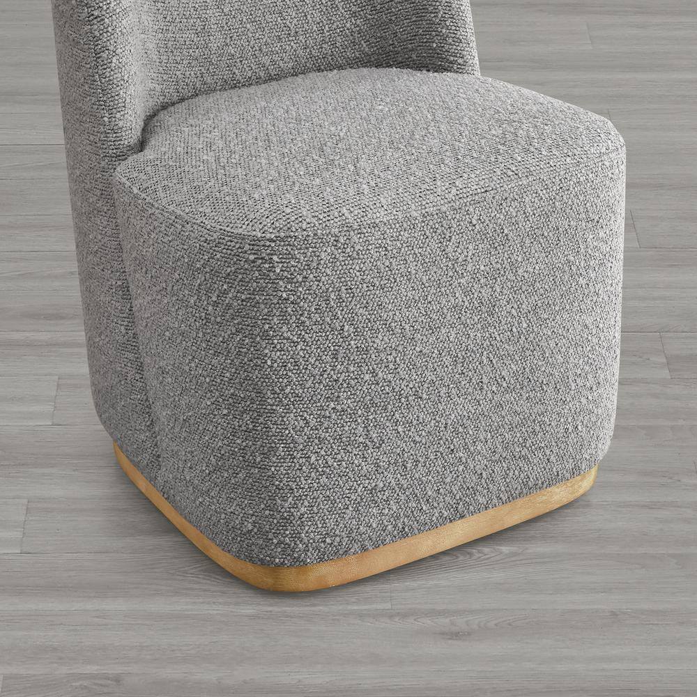 Close-up of the gray textured fabric on a dining chair.