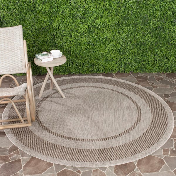 Courtyard Beige/Brown 7 ft. x 7 ft. Round Striped Indoor/Outdoor Patio  Area Rug