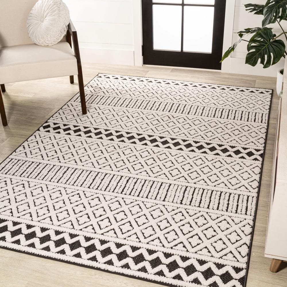 Cream and Black Geometric Synthetic Indoor/Outdoor Area Rug
