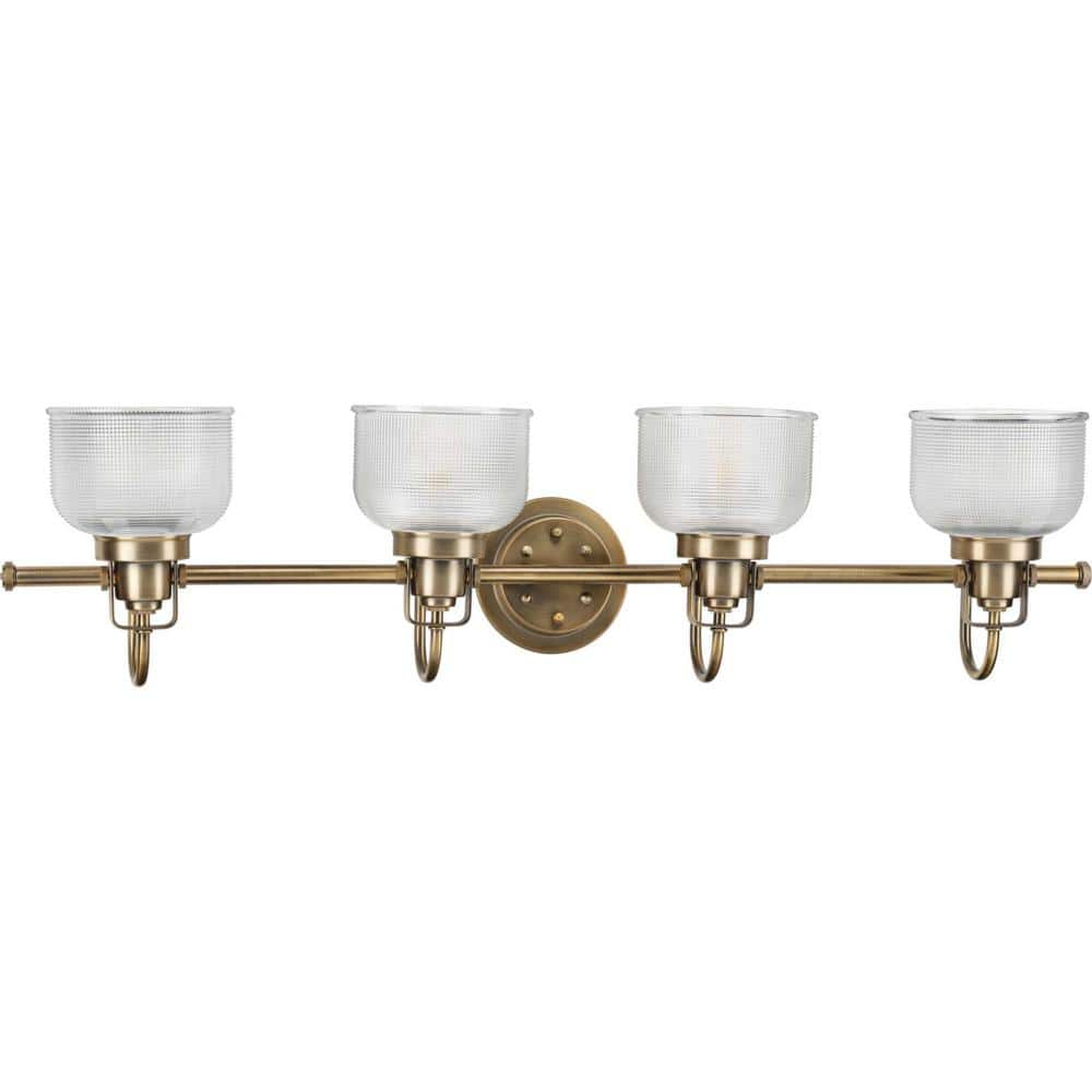 Vintage Brass Four-Light Bathroom Vanity Fixture with Prismatic Glass Shades