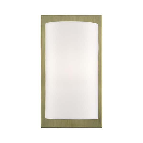 Livex Lighting Brenton 6 in. 1-Light Antique Brass ADA Wall Sconce with Off-White Fabric Shade