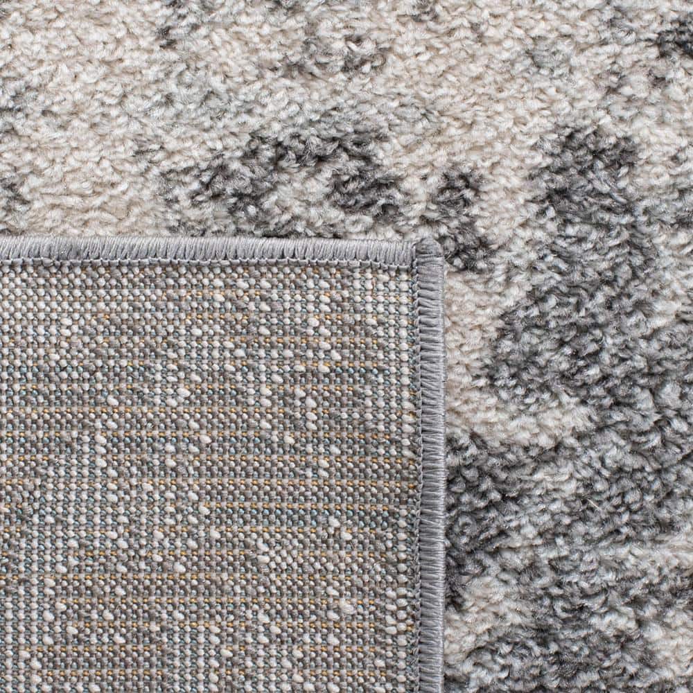 Ivory Abstract 4' x 6' Reversible Synthetic Area Rug