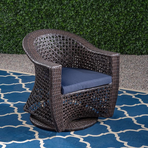 Noble House Big Sur Multi-Brown Swivel Faux Rattan Outdoor Lounge Chair with Navy Blue Cushion