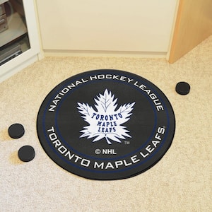 NHL Retro Toronto Maple Leafs Black 2 ft. Round Hockey Puck Area Rug