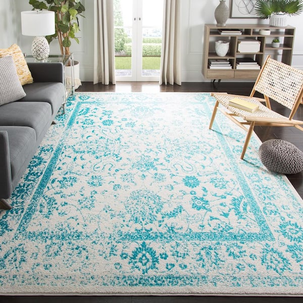 Adirondack Ivory/Teal Border Distressed 9 ft. x 12 ft.  Area Rug