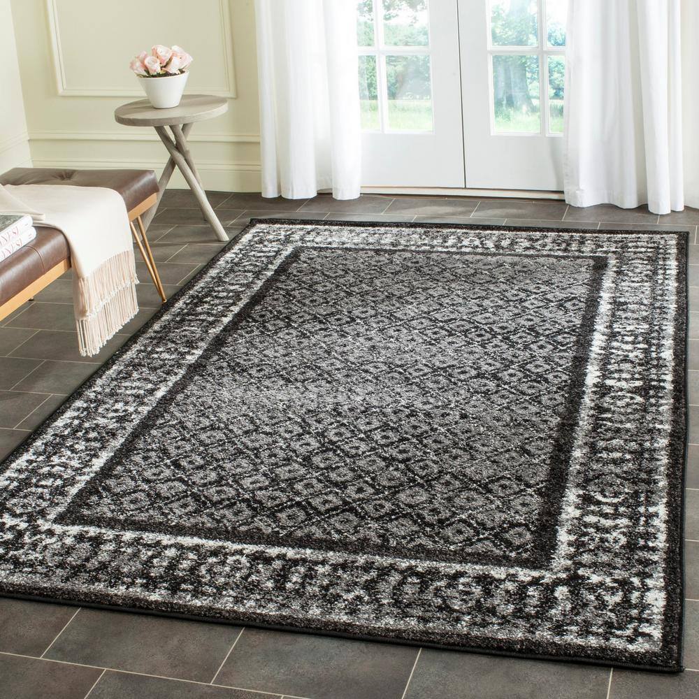 6' x 9' Black and Silver Synthetic Reversible Area Rug