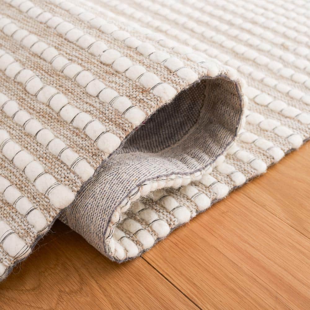 Ivory and Beige Handwoven Wool Area Rug, 4' x 6'