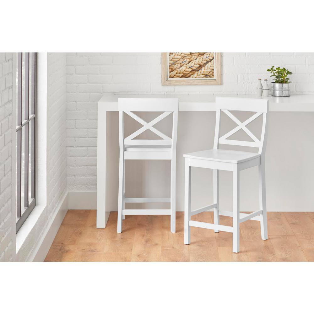 set of white bar stools