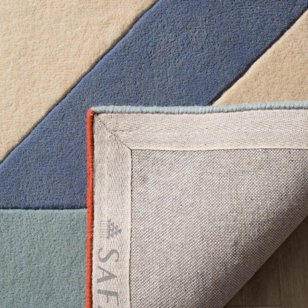 Ivory and Multicolor Geometric Wool Area Rug, 3' x 5'