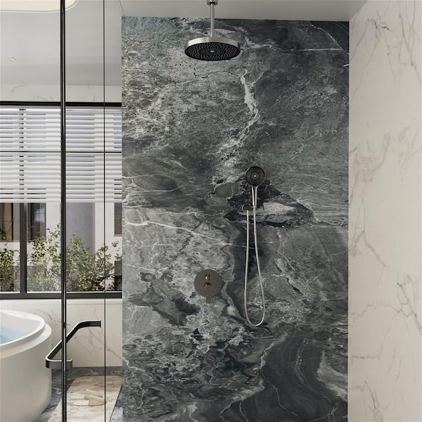 A luxury stand up grey marble shower with a rain shower head with