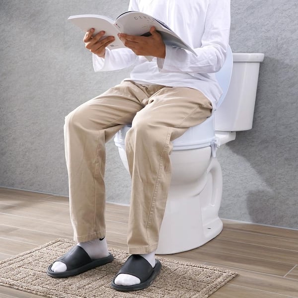 Raised Toilet Seat Round 4 in. Height Raised 300 lbs. Weight Capacity Toilet Seat in White Riser Screw Rod Locking