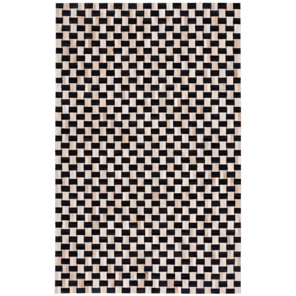 Black and Ivory Geometric Cowhide Area Rug