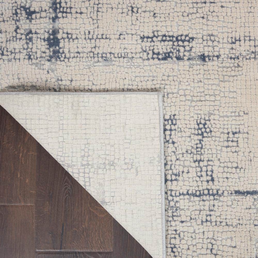 Modern Abstract Ivory & Blue Synthetic Area Rug 7'10" x 10'6"