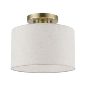 Blossom 10 in. 1-Light Antique Brass Small Semi-Flush Mount with Oatmeal Color Fabric Shade