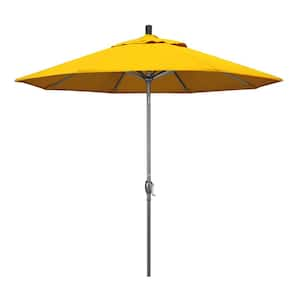 yellow patio umbrella with lights