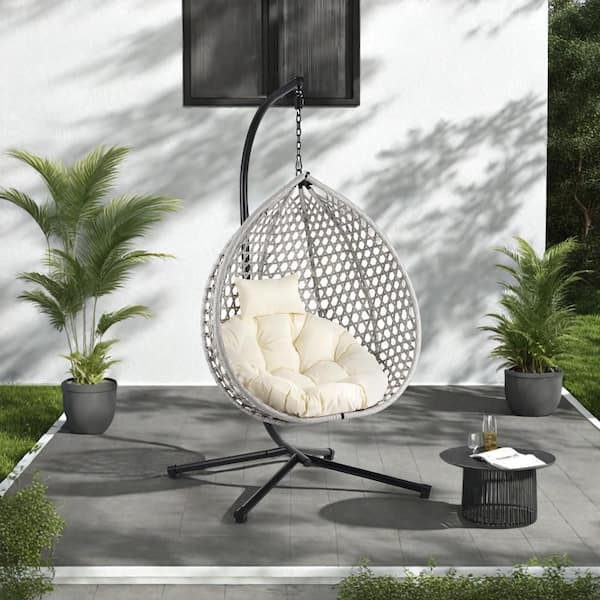 Cesicia Gray Wicker Patio Swing Egg Chair with Beige Cushion and Iron Stand