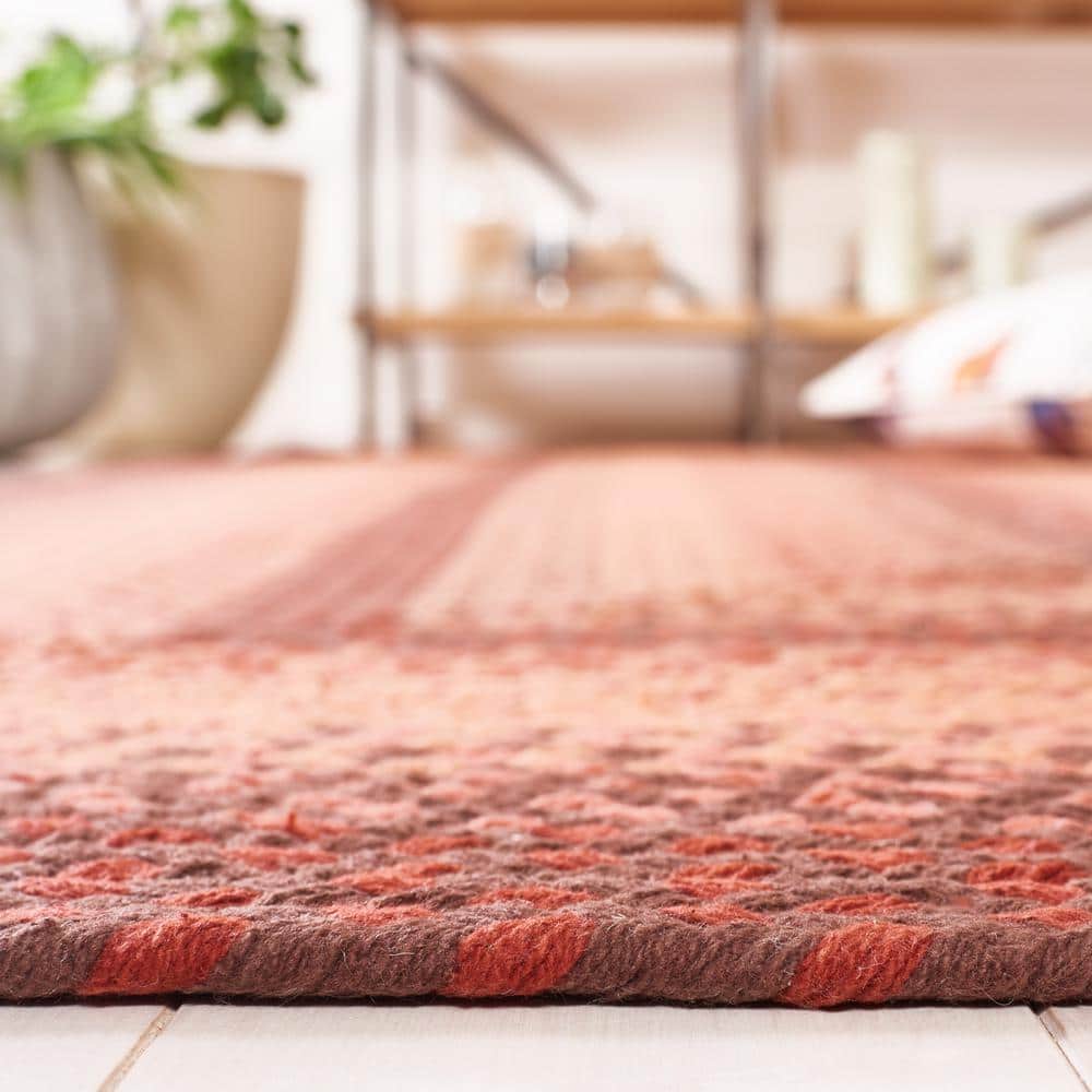 Handwoven Orange and Rust Braided Cotton Area Rug 4' x 6'